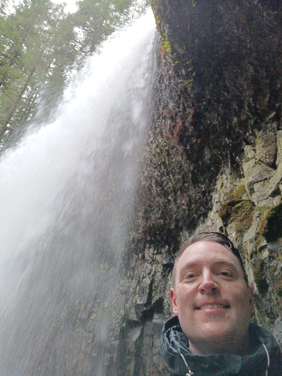 Christopher at a waterfall in Oregon